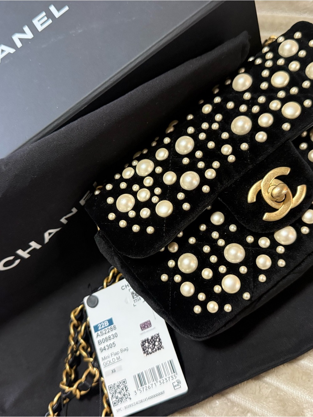 CHANEL Black Velvet Mini Flap Bag with Pearl Embellishments & Gold-Tone Hardware